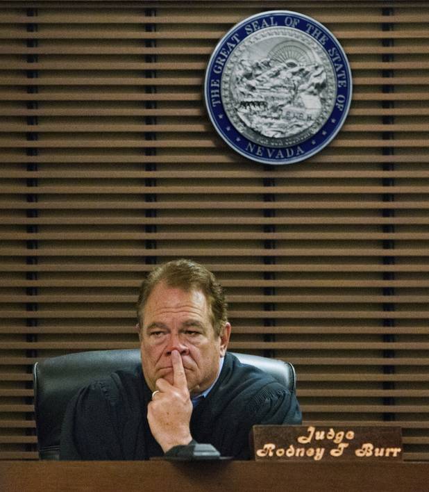 Judge Rodney Burr listens intently to the arguments presented to him by lawyers during a bail setting in Henderson Justice Court on Wednesday, Nov. 6, 2013.